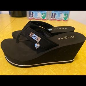 3 in. heel foam sole, felt straps wedge flip flop.